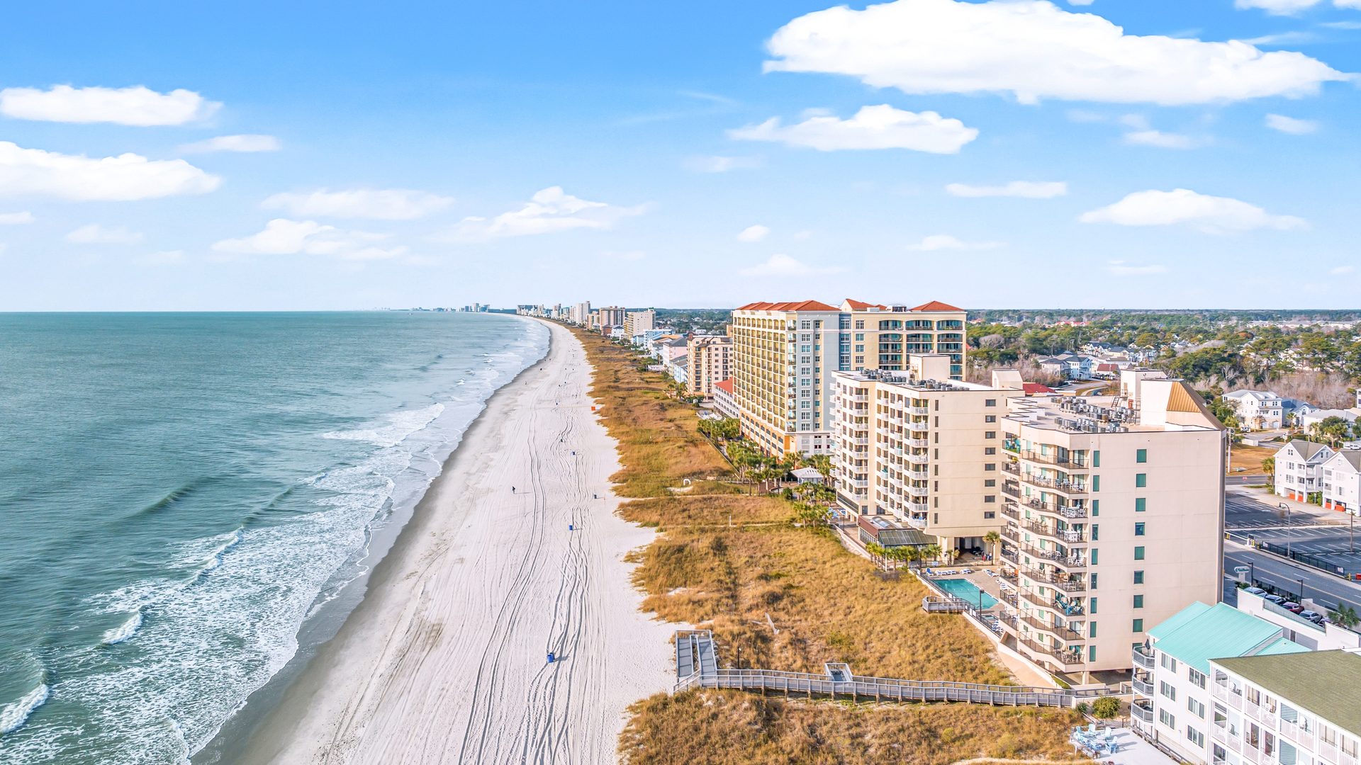 Aerial view along the Myrtle Beach shoreline on a clear day.